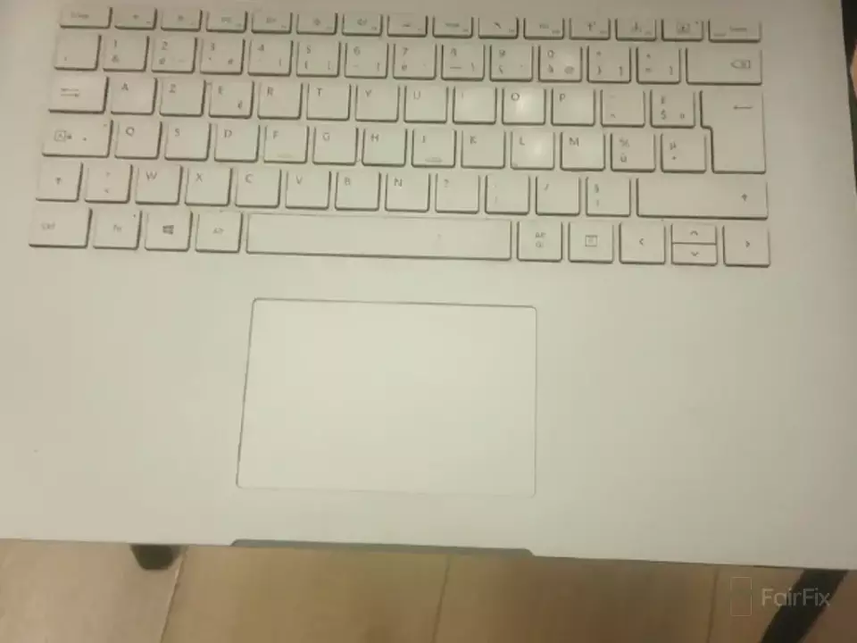 Réparation \n Surface Laptop Book 2 (Faux contact entre chargeur et connecteur de charge. Peut être problème de batterie aussi. A diagnostiquer)