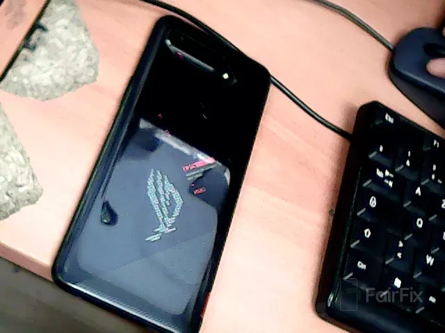 Réparation Smartphone Asus (Remplacement bouton power rouge.)